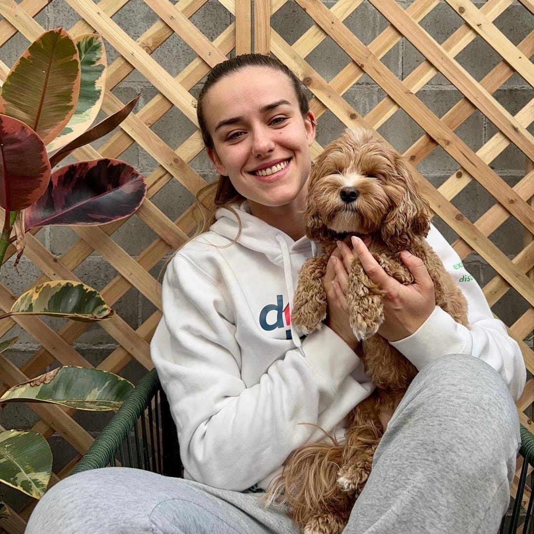 Giullia with a pup at Darlo's Den